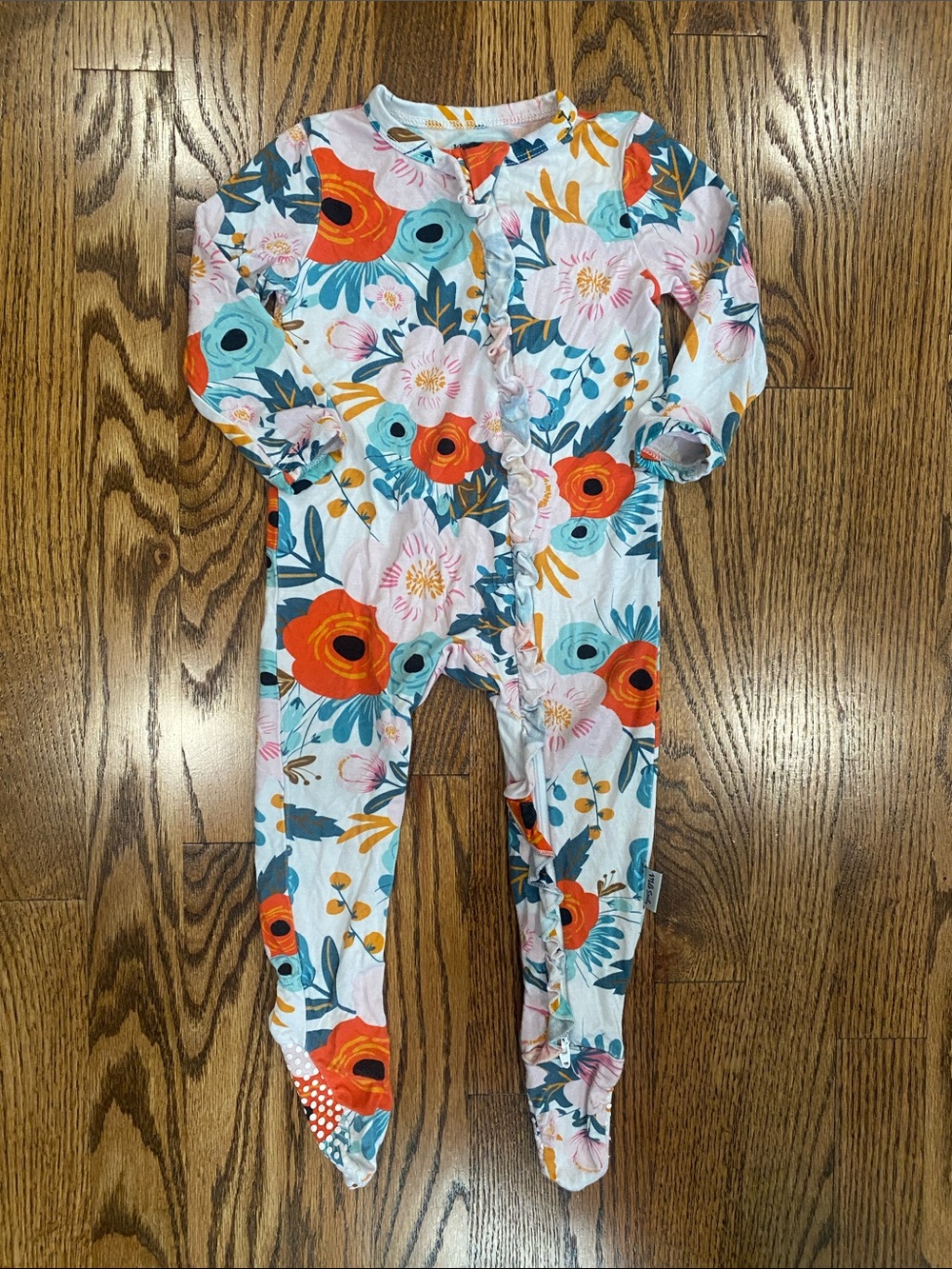 Milk Snob bamboo floral ruffle footie, size 6-12 months. Like new condition